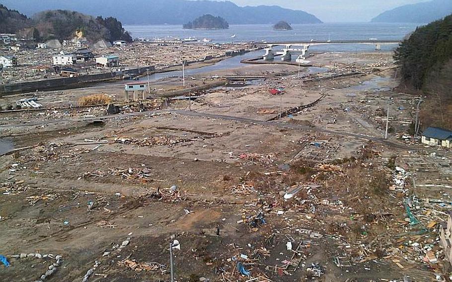 The Iwate prefecture town of Yamada lays in ruins following March 11?s tsunami, as shown in this picture taken not long afterward. The wave rushed from the bay in the background and into the city, where it destroyed nearly everything in its path. Lydia DeLeon-Rush and several others volunteers from the U.S. military community in Japan are refurbishing and then donating several dozen bicycles to families in Yamada and other towns along the nearby coast.