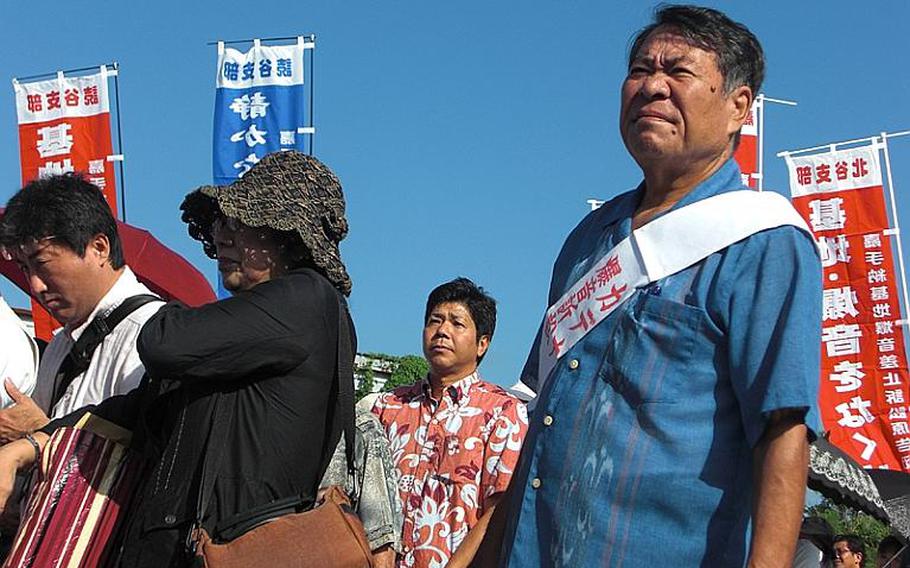 An opening hearing for a class-action lawsuit begins Oct. 20, 2011, over noise pollution from Kadena Air Base. About 300 residents and supporters held a rally before the session begins. More than 22,000 residents seek $455 million compensation from the Japanese government and court rulings to ban night air operations at the air base.