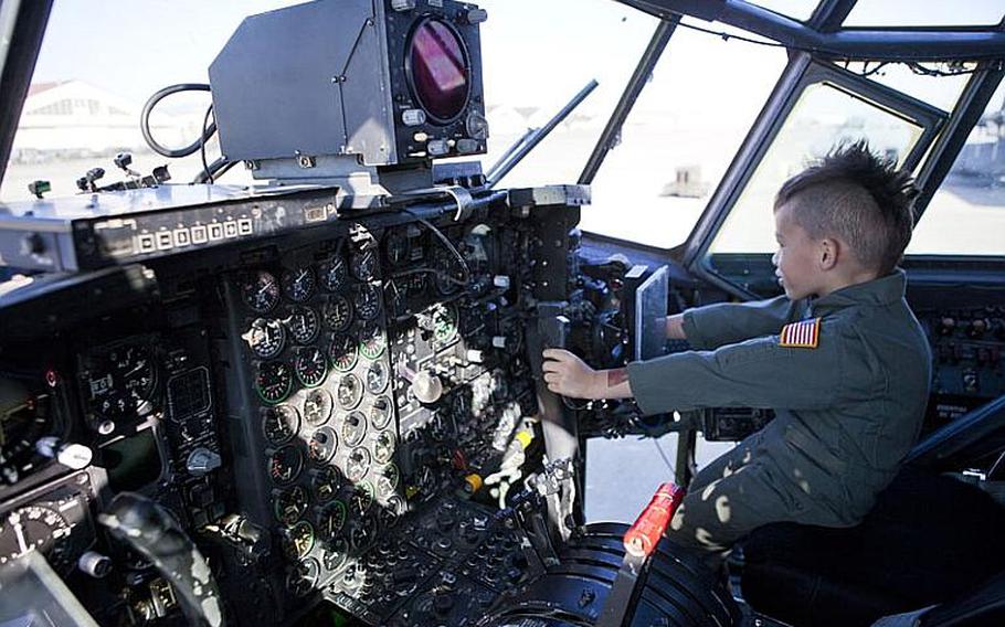 First-graders from Joan K. Mendel Elementary toured the flight line Nov. 2, 2011 at Yokota Air Base.
