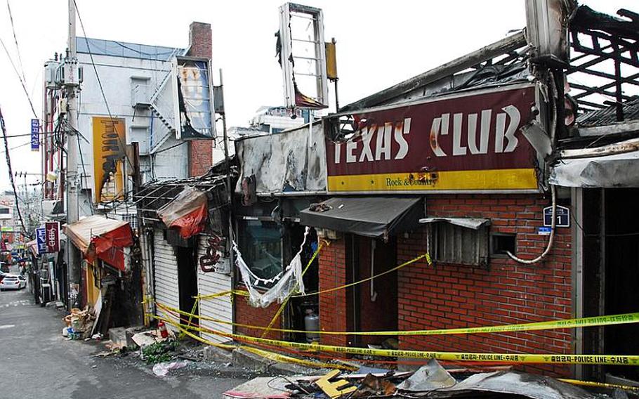 A U.S. soldier allegedly started a fire on Tuesday morning inside Tiger Tavern, a club on Itaewon's Hooker Hill, that spread to three adjacent businesses, all shown here.