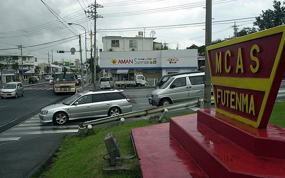 The main entrance to Marine Corps Air Station Futenma sits along busy Highway 58 about five miles south of Kadena Air Base on Okinawa.