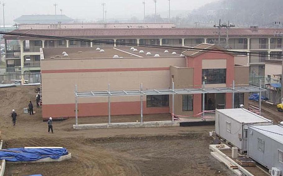 This December 2011 photo shows the under-construction commissary at K-16 Air Base, which will officially open on May 17, 2012. Until now, the approximately 900 troops stationed at K-16 have had to travel an hour to the nearest commissary at U.S. Army Garrison Yongsan.