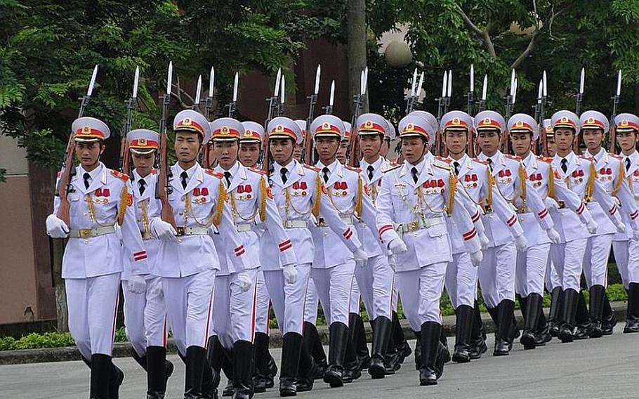 Members of Vietnam's military march in formation during a ceremony welcoming Secretary of Defense Leon Panetta in Hanoi, Vietnam, on June 4, 2012.