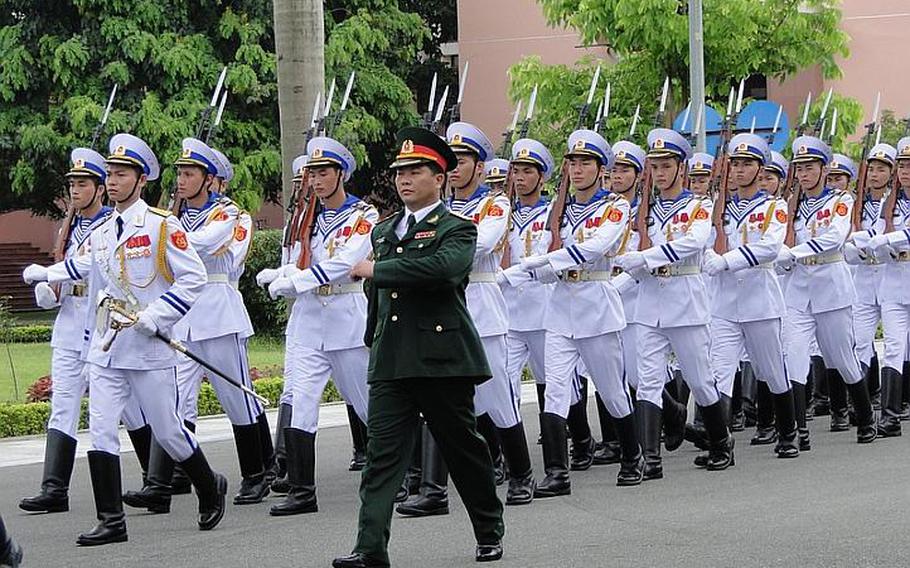 Members of Vietnam's military parade in step during a ceremony June 4, 2012, to welcome Defense Secretary Leon Panetta to Hanoi, Vietnam.