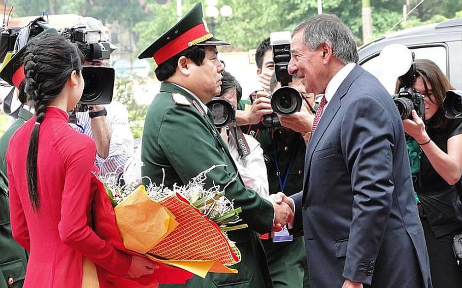 Vietnamese Defense Minister Gen. Phung Quang Thanh greets Defense Secretary Leon Panetta on June 4, 2012, in Hanoi, Vietnam. Panetta is in Vietnam to meet with that countr's defense officials.