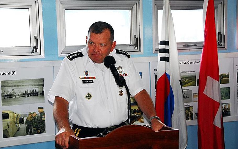 U.S. Forces commander Gen. James Thurman speaks July 27, 2012, during a ceremony marking the 59th anniversary of the signing of the armistice that ended Korean War hostilities on July 27, 1953. The ceremony was held in a conference room in the Joint Security Area of the Demilitarized Zone.