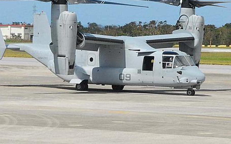 A Marine Corps MV-22 Osprey lands at Futenma air station after arriving late Monday morning from Iwakuni.