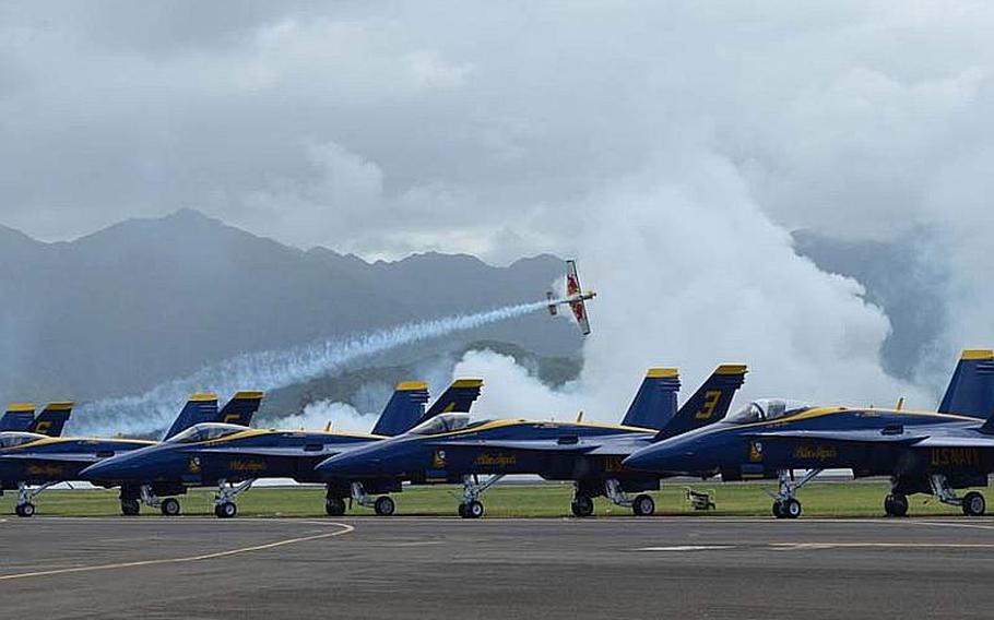 Kirby Chambliss performs at low altitude flyby prior to the Blue Angels appearance at the Kaneohe Bay Air Show, Sept. 30, 2012, at Marine Corps Base Hawaii.