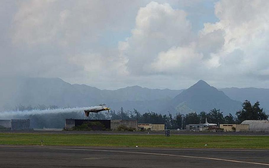 Kirby Chambliss performs at low altitude flyby prior to the Blue Angels appearance at the Kaneohe Bay Air Show on Sept. 30, 2012, at Marine Corps Base Hawaii.