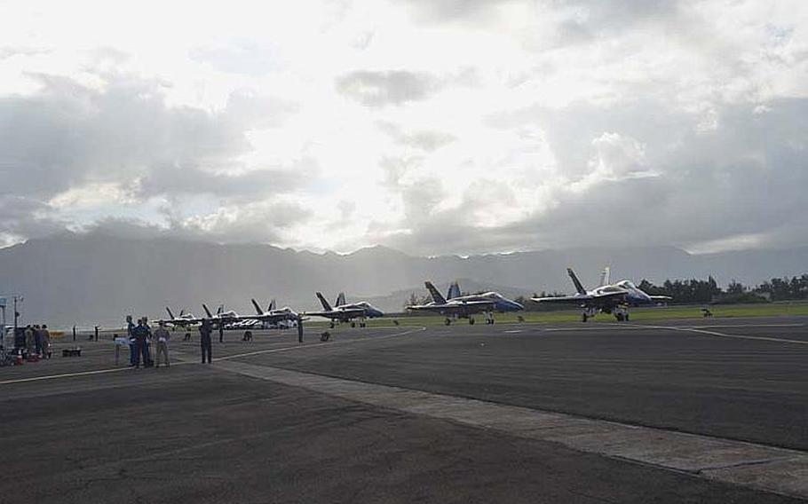 The Blue Angels land on the runway at the Kaneohe Bay Air Show on Sept. 30, 2012, at Marine Corps Base Hawaii. Tens of thousands of spectators turned out at Kaneohe Bay to watch the Navy aerobatic team, along with other aviators and parachutists.