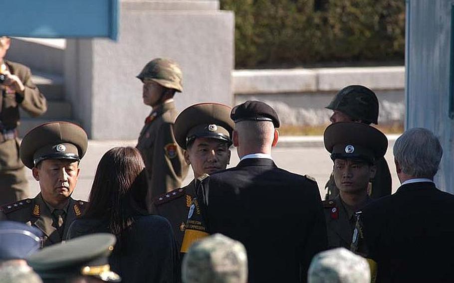 North Korean officers confer with a United Nations Command Honor Guard contingent on Oct. 18, 2012, at the conclusion of a repatriation ceremony in the Joint Security Area of the Demilitarized Zone.