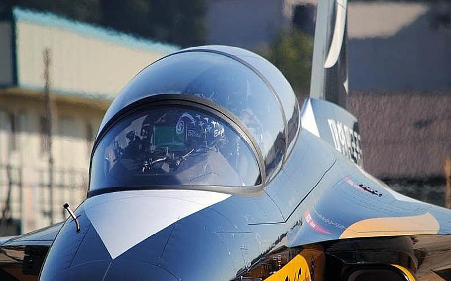 A Republic of Korea Air Force Black Eagles pilot starts his T-50B for a practice air demonstration at Osan Air Base, South Korea on Oct. 18, 2012.