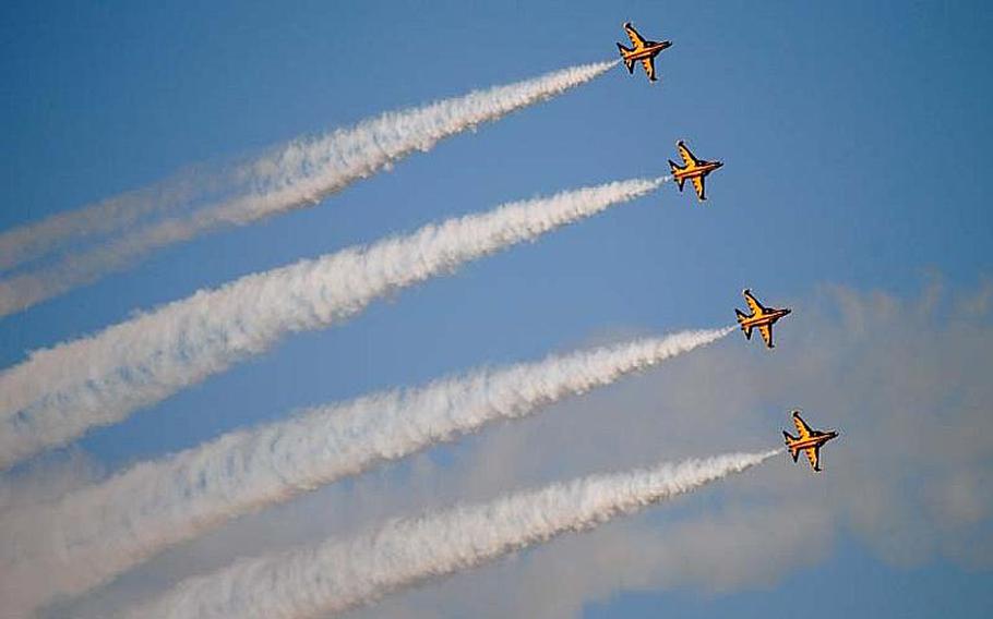 Four Republic of Korea Air Force Black Eagles complete a turn during practice run  at Osan Air Base, South Korea on Oct. 18, 2012.