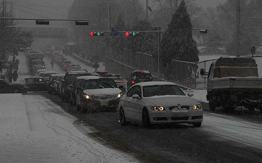 Traffic came to a near-standstill at U.S. Army Garrison Yongsan early afternoon of Dec. 5, 2012, as heavy snow caused slick roads. Between three and five inches of snow were expected to fall in Seoul.