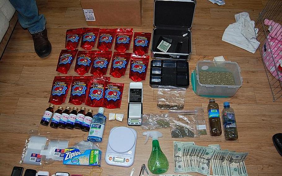 This undated photo shows items confiscated Oct. 29, 2012, from the home of a U.S. soldier suspected of manufacturing and distributing Spice. The items include acetone and bags of catnip, which were mixed with synthetic marijuana that had been mailed to him in South Korea to create what South Korean police describe as a new blend of the drug.