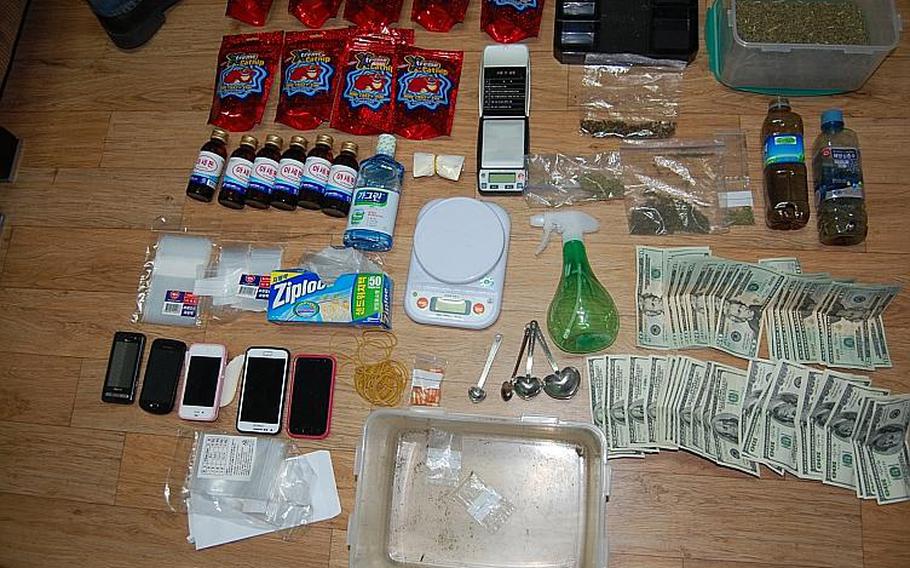 This undated photo shows items confiscated on Oct. 29, 2012, from the home of a U.S. soldier suspected of manufacturing and distributing Spice. The items include acetone and bags of catnip, which were mixed with synthetic marijuana that had been mailed to him in South Korea to create what South Korean police describe as a new blend of the drug.