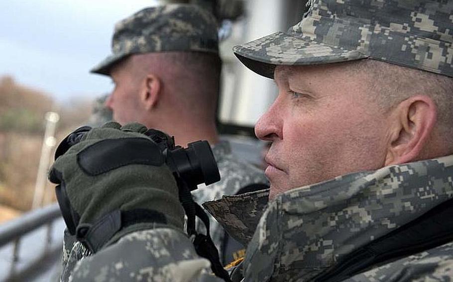 U.S. Army Gen. James Thurman, U.S. Forces Korea commander, looks towards North Korea during a visit to the Demilitarized Zone in South Korea on Nov. 11, 2012. Thurman told a town hall meeting on Jan. 23 that U.S. forces are in a period of "high vulnerability" following Pyongyang's test of a long-range rocket in December.
