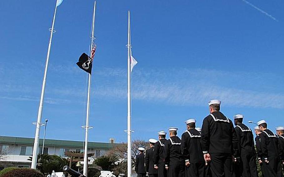 About 40 sailors from various commands along with base leadership gathered at Sasebo Naval Base's Lt. Daniel Godsoe Plaza on the afternoon of March 11, 2013, to commemorate the massive earthquake and tsunami that rocked Japan on March 11, 2011, and honor its victims. Many sailors from the small base in southern Japan deployed as a part of rescue and recovery efforts.