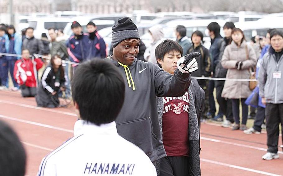 Nine-time Olympic gold medalist Carl Lewis coaches young Japanese athletes during a sports clinic in Ishinomaki, Japan, on March 23, 2013. Lewis, along with former U.S. Olympic athletes Mike Powell and Willie Banks, and Japanese Olympian Dai Tamesue, visited the tsunami-battered Tohoku region of Japan on Saturday and Sunday, where they also hosted a sports summit that discussed how young people from the area could train to compete in the Olympics.
