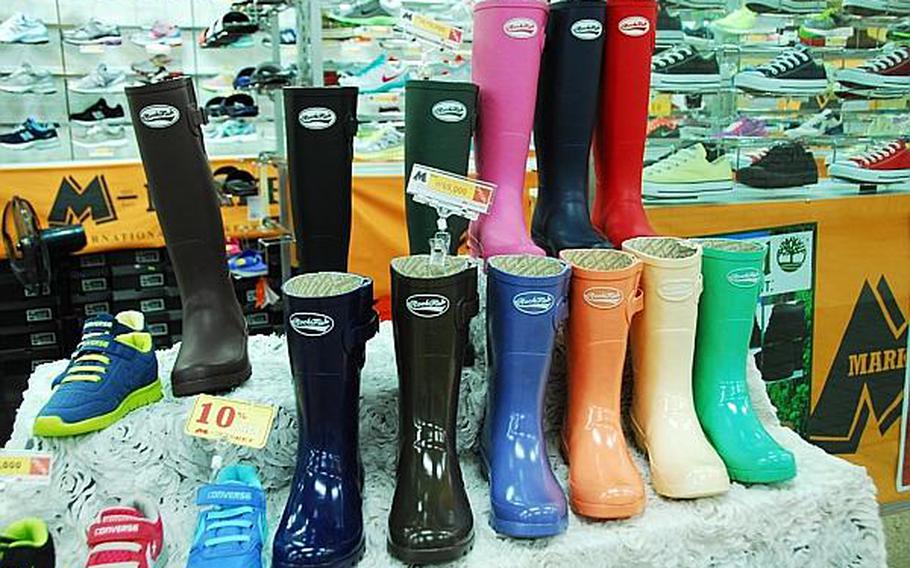 Rain boots are on display at a shoe store in a subway station near the U.S. Army Corps of Engineers Far East District Compound in Seoul. This week marked the beginning of the annual summer monsoon season in South Korea, when more than half of the country's annual precipitation falls and is usually concentrated in a 30-day period.