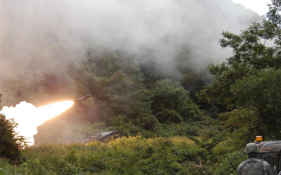 A rocket is fired during a U.S. military training exercise Sept. 25, 2013, near the Demilitarized Zone in South Korea. Crews from the 2nd Infantry Division's 6th Battalion, 37th Field Artillery Regiment, 210th Fires Brigade, were putting their Multiple Launch Rocket Systems through their their paces as part of the process they must go through every six months to maintain their certification.
