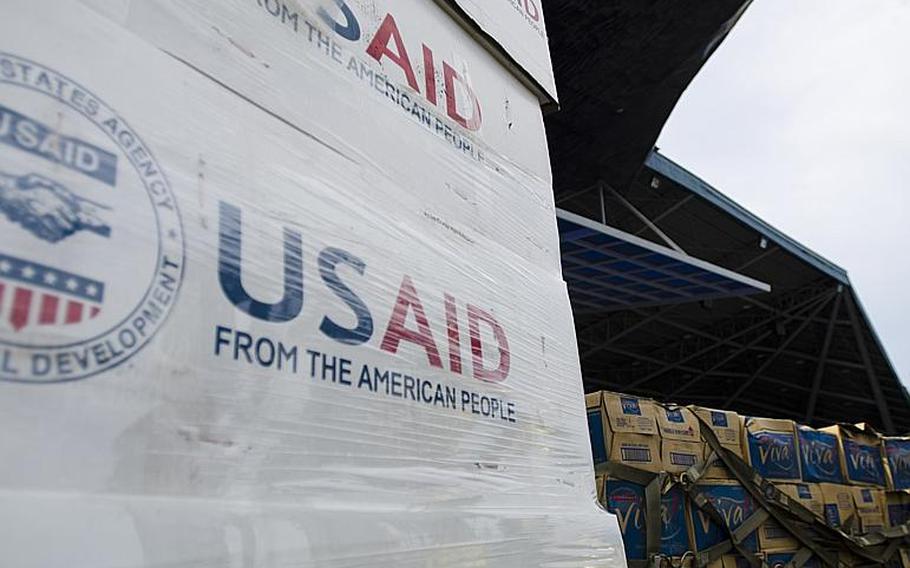 Boxes of relief supplies wait at Villamor Air Base in the Philippines.