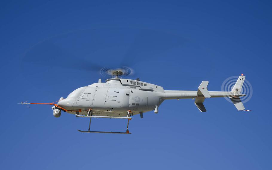 An MQ-8C Fire Scout helicopter in flight.