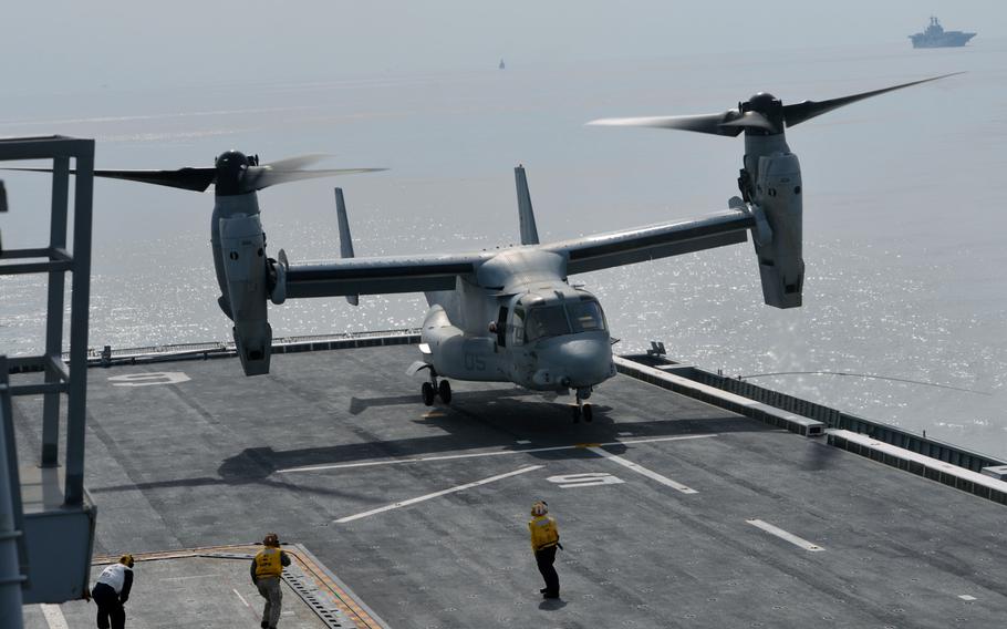 An MV-22 Osprey touches down on the deck of the South Korean ship ROKS Dokdo off the southern coast of the Korean peninsula on March 26, 2015.