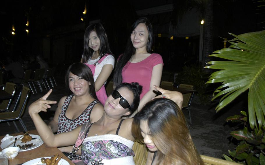 A group of Jennifer Laude's transgender Filipina friends pose in Olongapo City, Philippines, in March 2015.