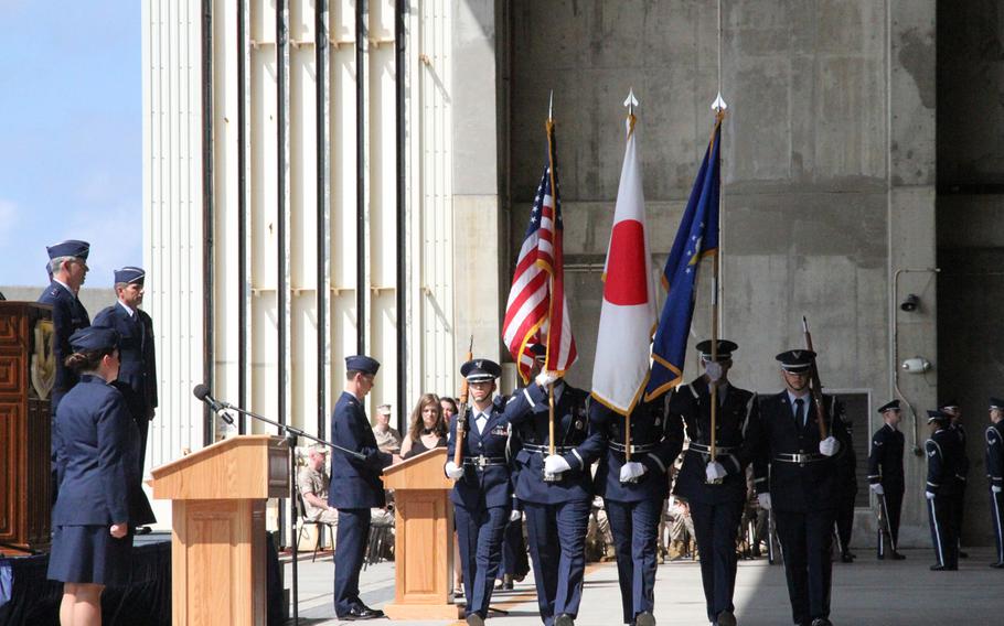 The honor guard arrives at Thursday's change-of-command ceremony at Kadena Air Base on Okinawa, Japan.