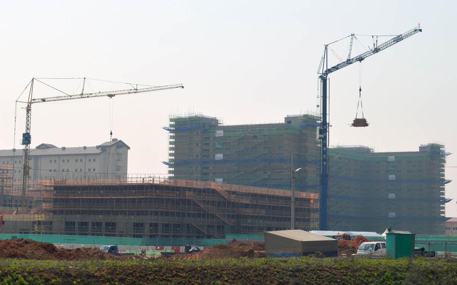 New barracks under construction at Camp Humphreys, South Korea, on April 24, 2015. On the far left is a recently completed barracks.