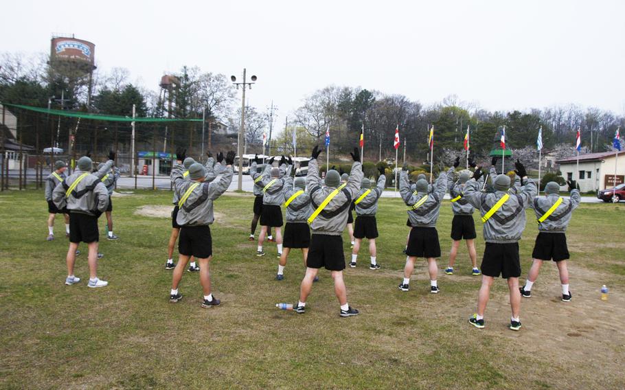 U.S. troops start the day with physical training at Camp Bonifas, South Korea, near the Demilitarized Zone, in April 2015.