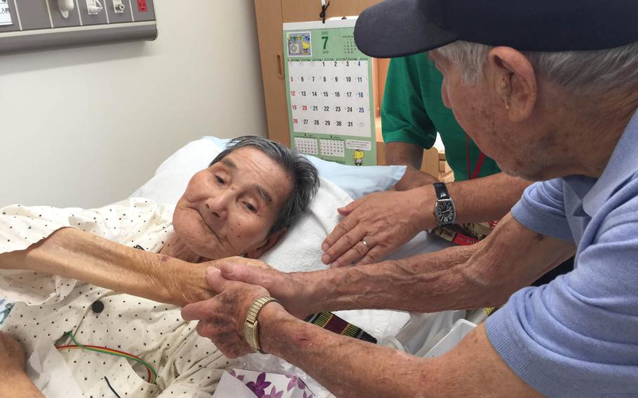 Leon Cooper greets Kokichi Nishimura, left, July 25, 2015, at a Japanese hospital. Cooper was a Navy lieutenant commanding a group of landing craft called Higgins boats launched from the USS Harry Lee, a passenger ship that carried Marines to some of the toughest battles of the Pacific, including the invasion of New Guinea. Nishimura was a lance corporal in the Imperial Japanese Army's South Seas Detachment and participated in the invasion of Guam before fighting in New Guinea. The World War II veterans shared war stories and talked of their efforts to retrieve the remains of fallen U.S. and Japanese soldiers from remote Pacific battle sites.