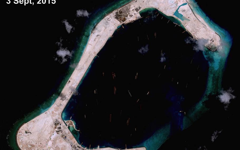 Subi Reef, as shown by a satellite image taken Sept. 3, 2015. China appears to be preparing to build a military-capable runway on the reef, which is also claimed by several of the nation's neighbors.