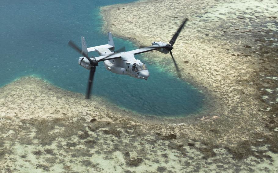 An MV-22 Osprey tiltrotor aircraft flies over the Northern Marianas Islands, Aug. 13, 2015. The Department of Navy has ordered further environmental study ahead of a proposed training facilities expansion on the U.S. commonwealth's Tinian and Pagan islands in the northern Pacific.