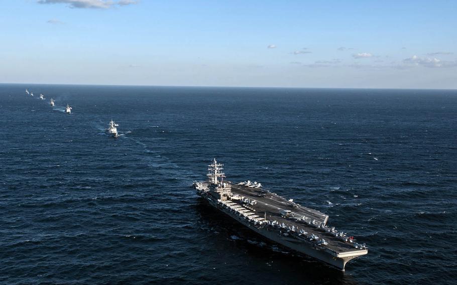 The Ronald Reagan Carrier Strike Group and South Korean navy ships steam in formation during an exercise Tuesday, Oct. 27, 2015, in international waters to the east of the Korean Peninsula. Two Russian aircraft flew within one nautical mile at a height of 500 feet, prompting the carrier to launch four fighter jets in response. The Russian aircraft left without further incident.
