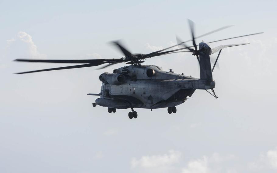 A CH-53E Super Stallion from Marine Heavy Helicopter Squadron 462, 3rd Marine Aircraft Wing flies off the coast of Okinawa, Japan, July 31, 2017.