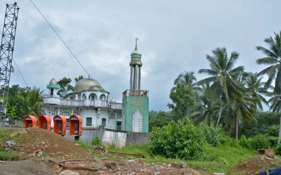 A mosque on the road to Marawi, Philippines, where the Filipino soldiers fought a bloody battle against Islamic State insurgents this summer.