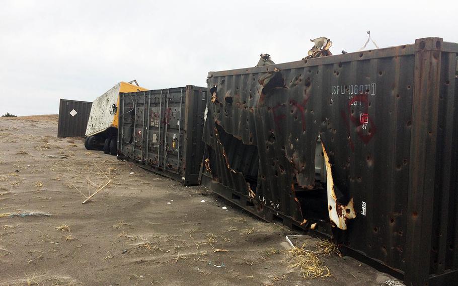Old shipping containers used as targets have taken a beating at Draughon Range near Misawa Air Base, Japan, Nov. 14, 2017.