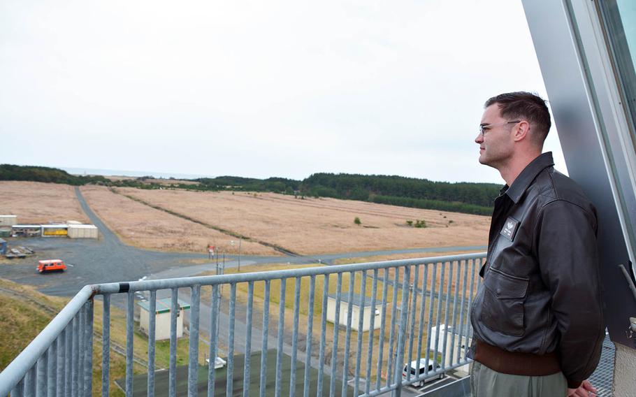 Maj. Daniel House, 34, an electronic warfare officer with the 35th Operations Support Squadron, watches training from a control tower at Draughon Range near Misawa Air Base, Japan, Nov. 14, 2017.