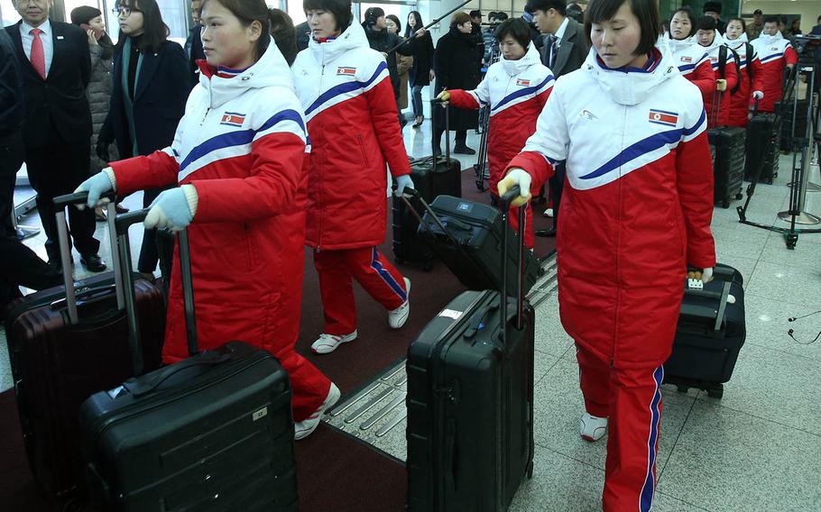 Members of the North Korean women's ice hockey arrive in South Korea on Thursday, Jan. 25, 2018, to prepare for the Olympics. The two countries have agreed to compete with a combined team in the sport.