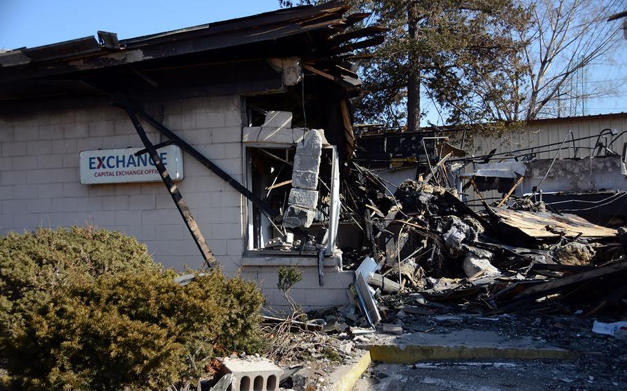 The remnants of a building that was destroyed in a fire at Yongsan Garrison, South Korea, are seen on Saturday, Feb. 17, 2018.
