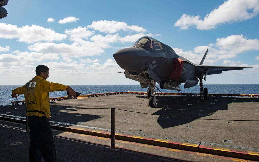 An F-35B is lowered into the hangar bay of the amphibious assault ship USS Wasp in the East China Sea in this March 2018 photo.