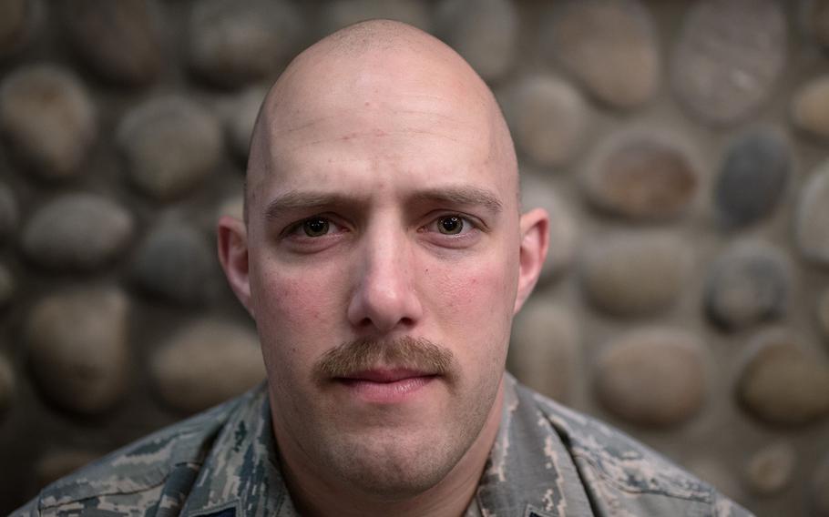 1st Lt. Phillip Norman of the 8th Civil Engineer Squadron, 8th Fighter Wing displays his mustache at Kunsan Air Base, South Korea, Tuesday, March 27, 2018.
