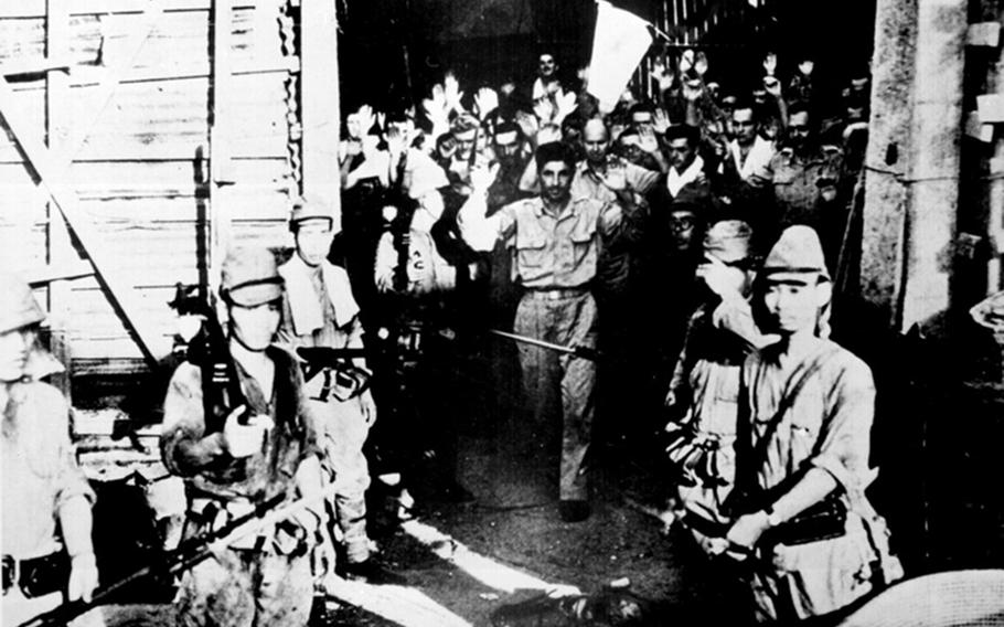 This May 1942 photo shows the surrender of American troops at Corregidor, Philippines, during World War II.