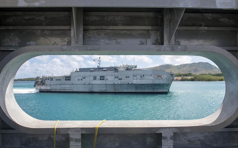 The USNS Brunswick prepares to moor at Naval Base Guam in support of this year's Pacific Partnership mission, March 16, 2018.