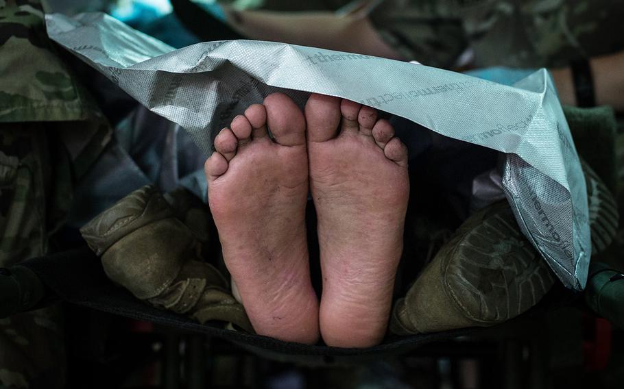 A patient's feet during a mass casualty scenario at the 121st Combat Support Hospital on Camp Humphreys, South Korea, Friday, April 20, 2018.