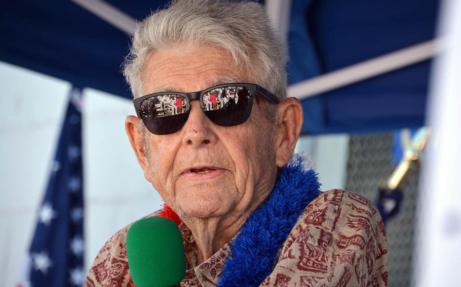 Ray Emory, who manned a .50-caliber machine gun aboard the USS Honolulu to defend against the Dec. 7, 1941, surprise attack on Pearl Harbor, speaks to sailors and family members gathered during a farewell ceremony, June 19, 2018, near where the ship was berthed in Pearl Harbor.