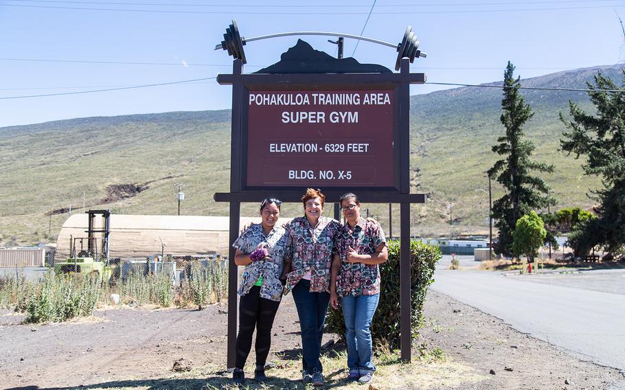 Members of the Kilauea Military Camp housekeeping staff pose at Pohakuloa Training Area, Hawaii, Thursday, July 19, 2018.