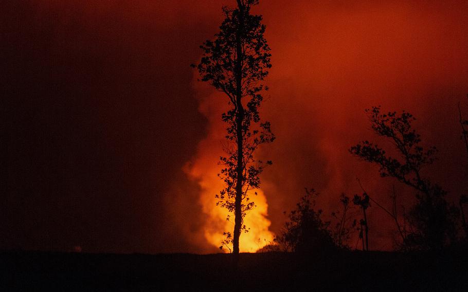 A fissure from the Kilauea volcano is seen from Leilani Estates, Hawaii, Tuesday, July 17, 2018.